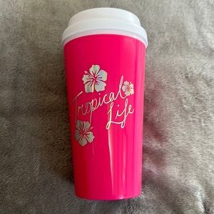 Never used pink travel cup sip thru lid